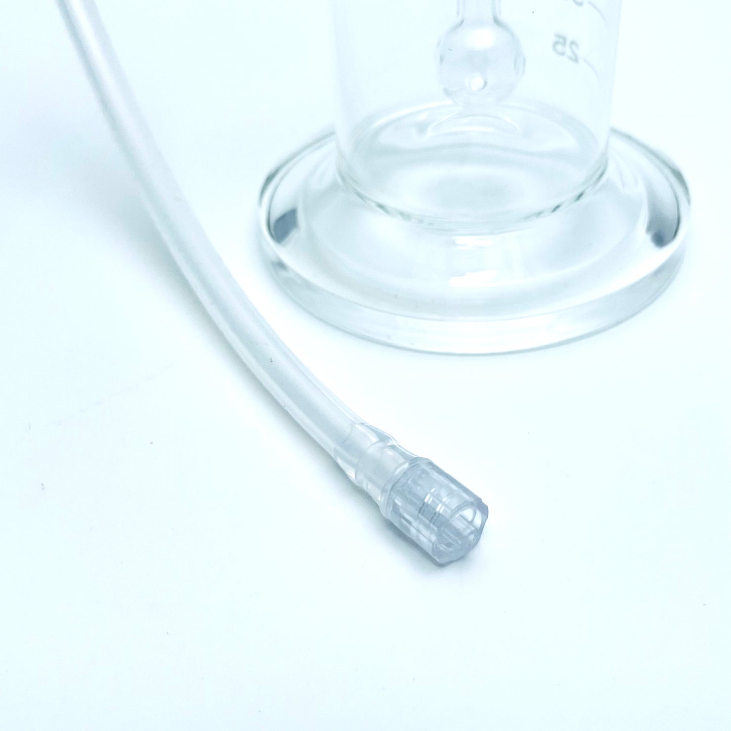Close up on luer lock on fluid bubler tubing.