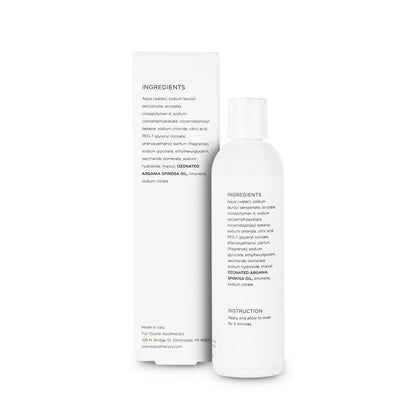 A bottle of Ozone Pet Shampoo next to its packaging box, backside with inggredients.
