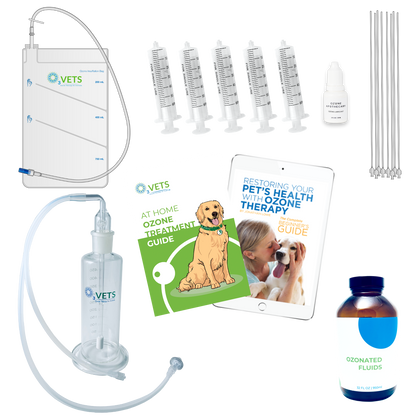 A collection of silver-colored pet treatment accessories including a fluid bubbler, fluid jar, rectal catheters, ozone syringes, an insufflation bag, lubricant, and treatment guides.