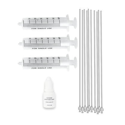 Three ozone syringes, ten rectal catheters, and a bottle of ozone lubricant, all laid out on a white background.